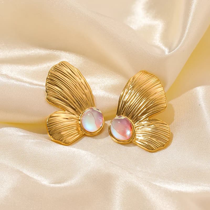 Pendientes de botón y gota con motivo floral dorado