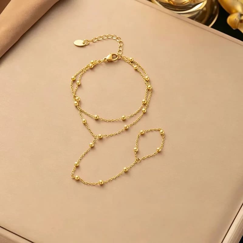 Pulsera de cadena con cuentas metálicas texturizadas