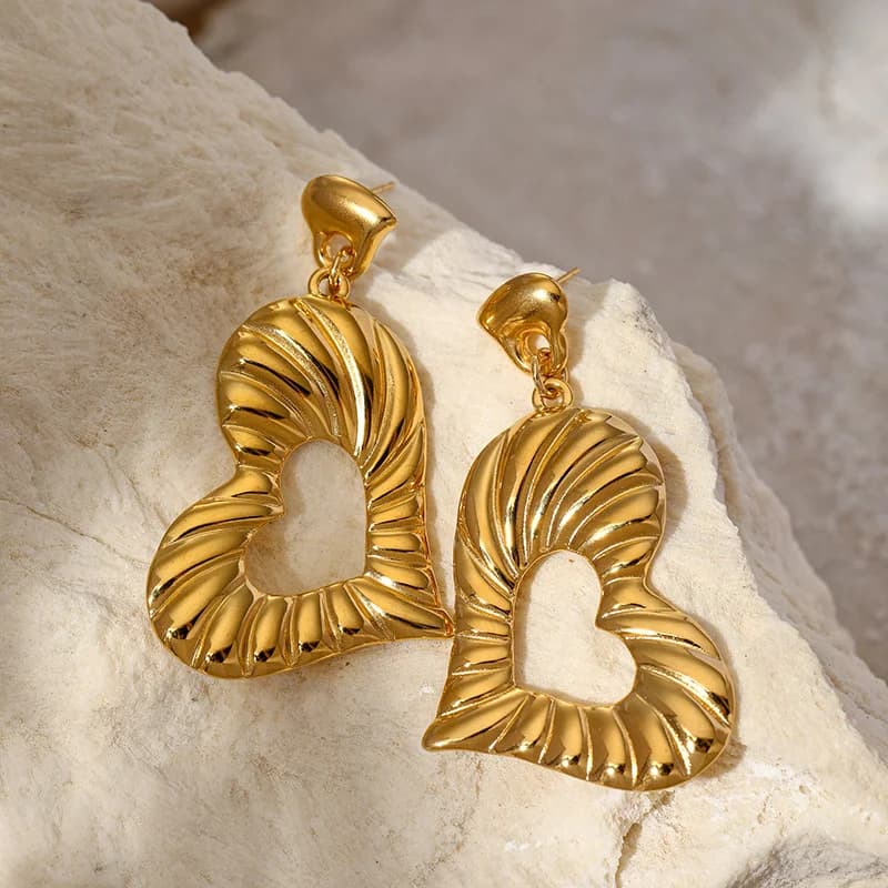 Pendientes de aro con colgante de borla de concha