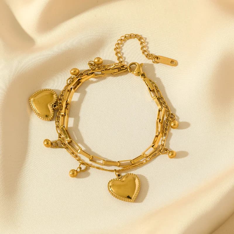 Pulsera de charms sol, luna y estrella de mar dorada