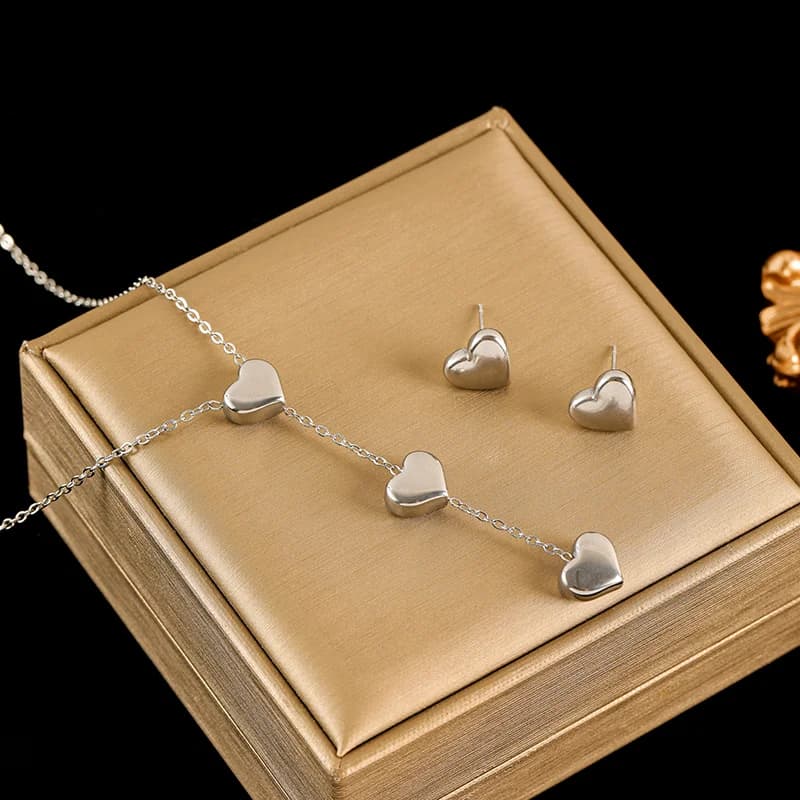 Set de collar y pendientes con corazón brillante, plata