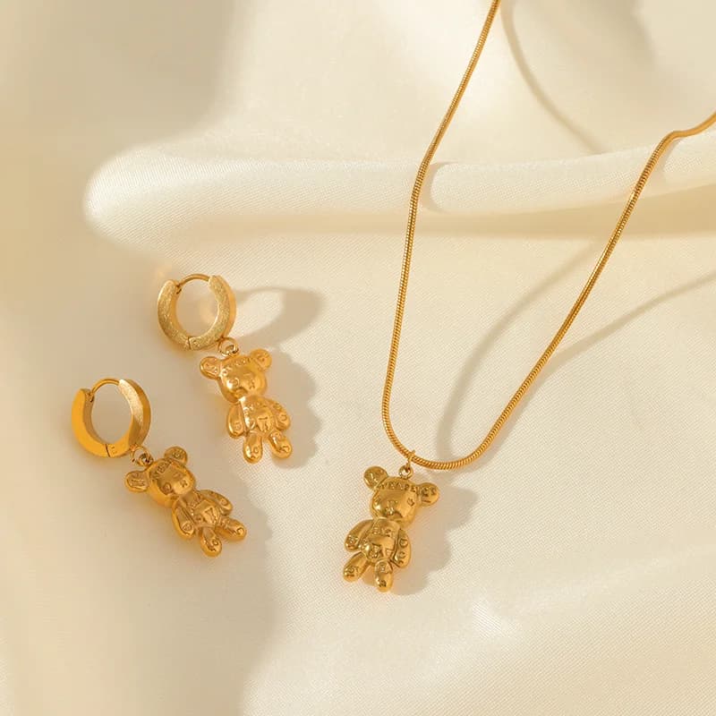 Set de Collar y Pendientes de Oso y Flor, Dorado