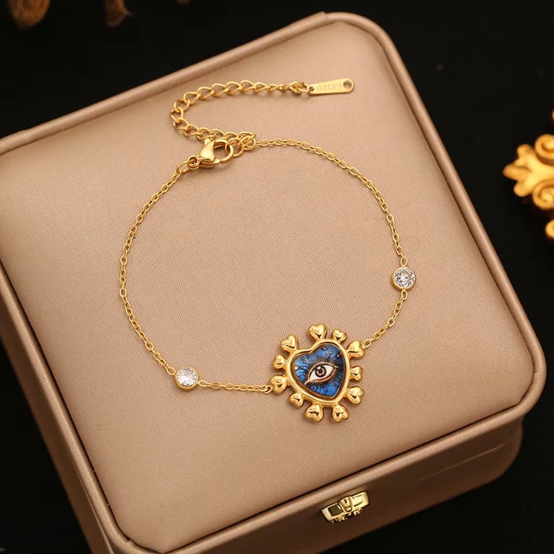 Pulsera con dijes de estrella de mar y concha sobre cadena de cordón
