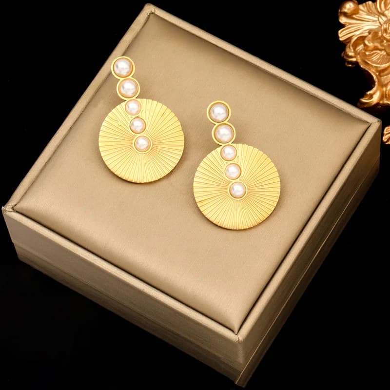 Pendientes colgantes de acero inoxidable con diseño irregular en color dorado