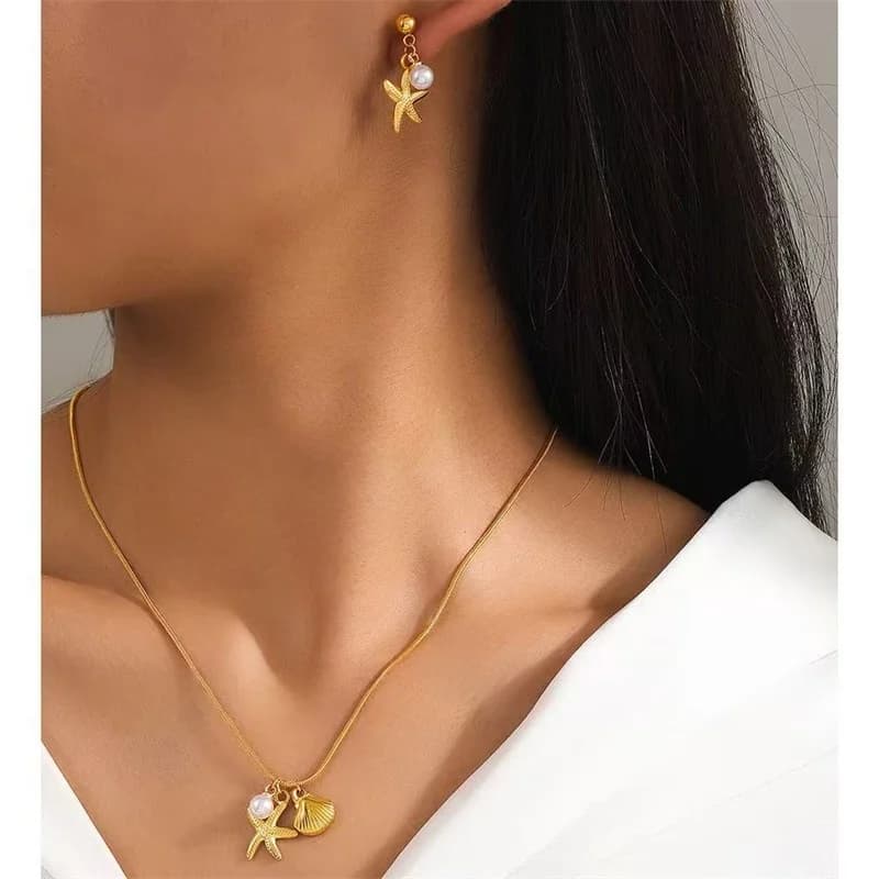 Set de collar y pendientes de estrella de mar y perla