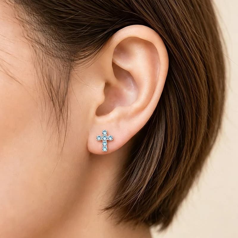 Piercing corporal de titanio con cruz espiral y circonita