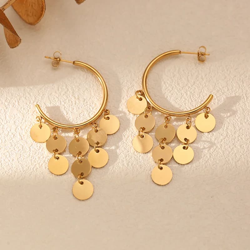 Pendientes de aro con colgante de borla de concha