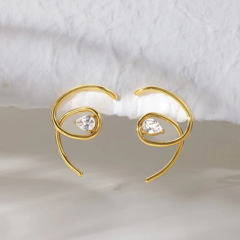 Pendientes Colgantes de Pluma y Hoja en Dorado