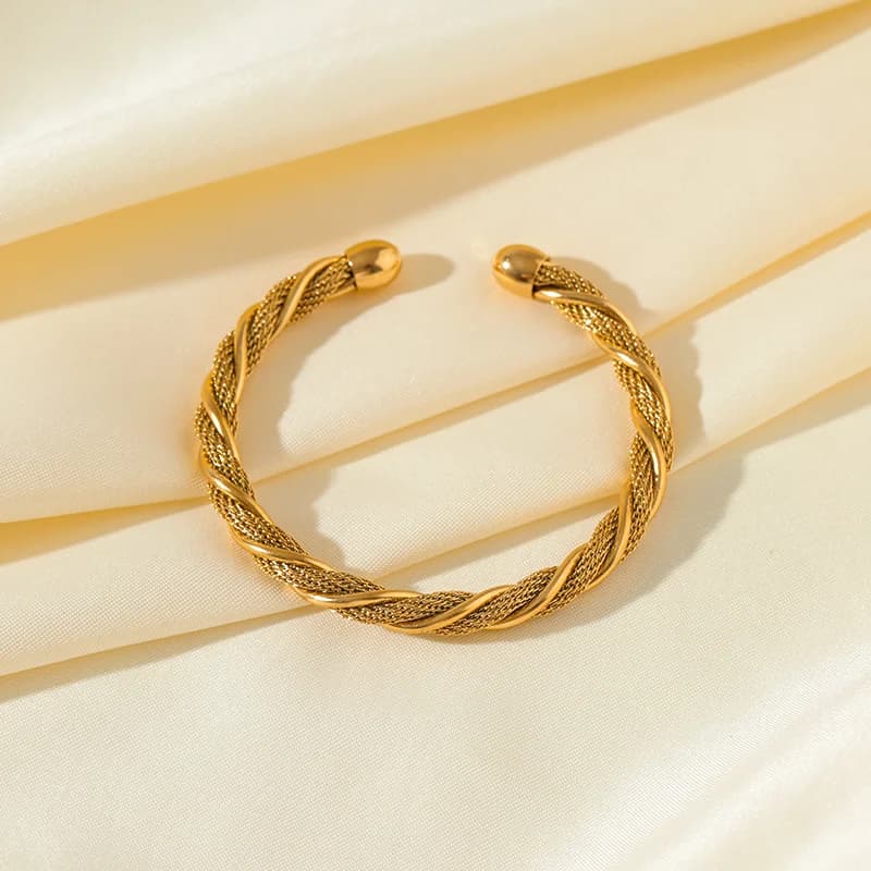 Brazalete ajustable trenzado en acero inoxidable 316L color oro