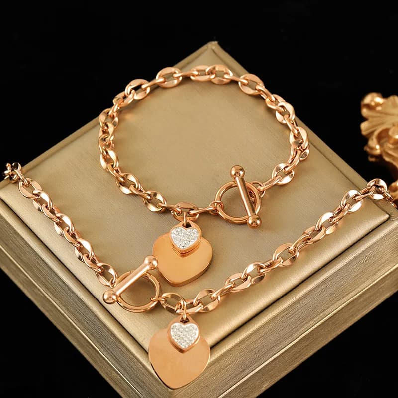 Juego de collar y pulsera de doble corazón, plata