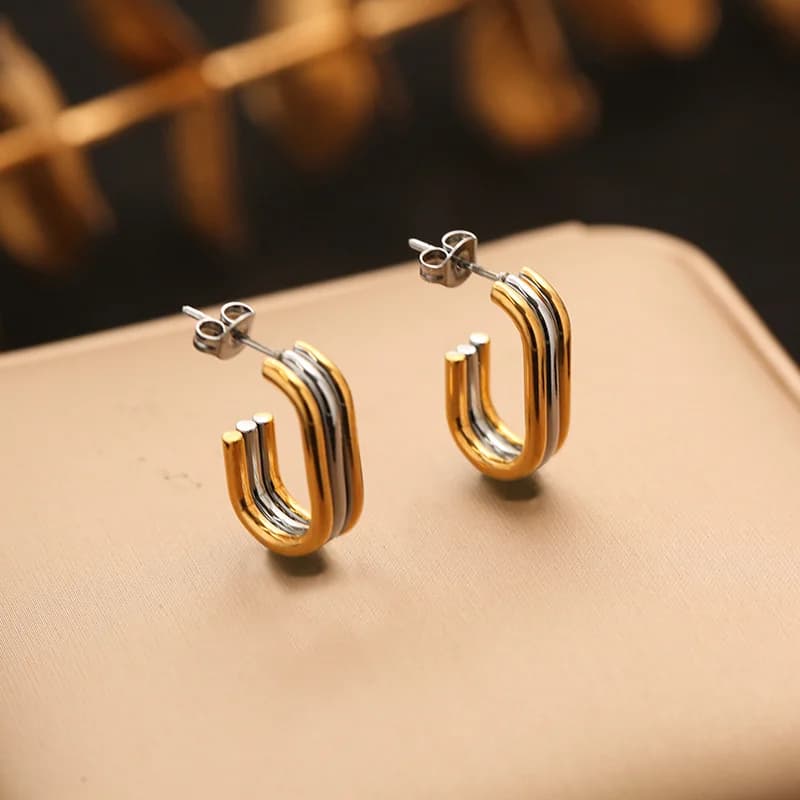 Pendientes de botón geométricos bicolor en acero inoxidable 316L