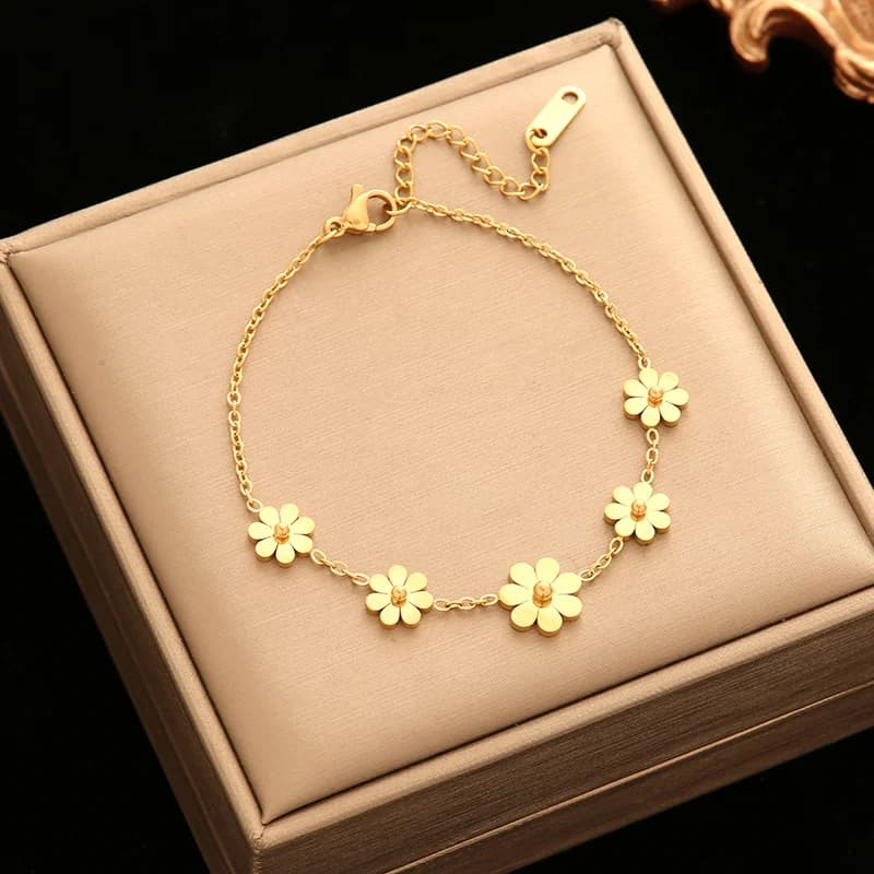 Pulsera con dijes de pétalos de flor, color oro