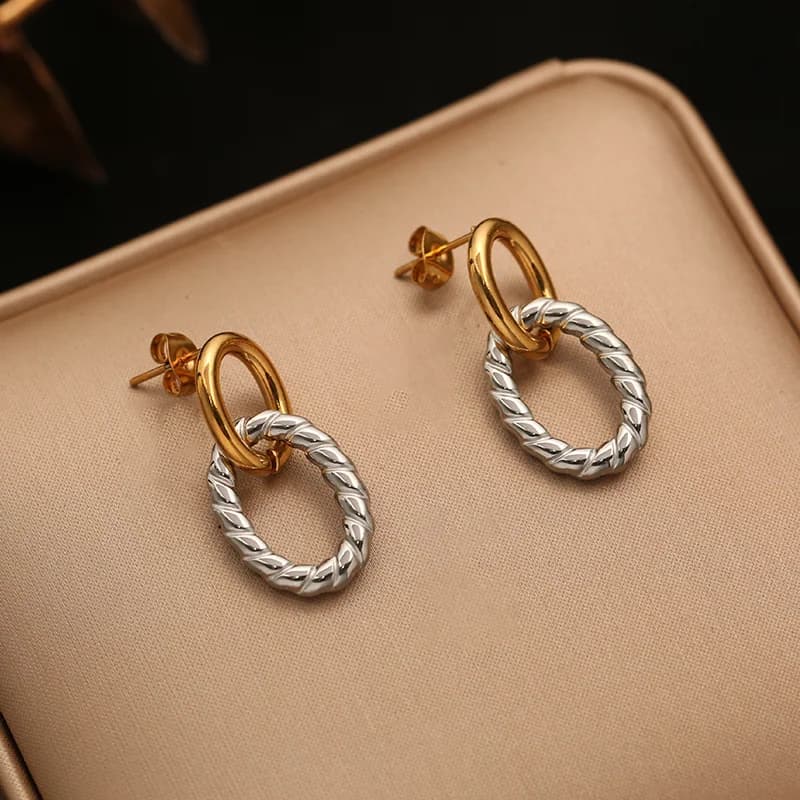 Pendientes de botón geométricos bicolor en acero inoxidable 316L