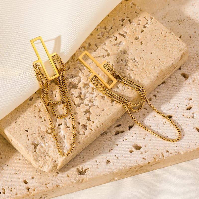 Pendientes colgantes con borlas color oro