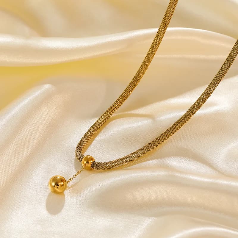 Set de collar con colgante de cuentas y pendientes, dorado