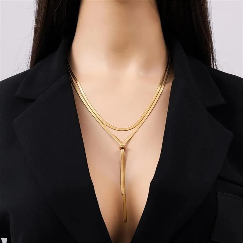 Collar largo cadena serpiente color oro con borla en acero inoxidable 316L