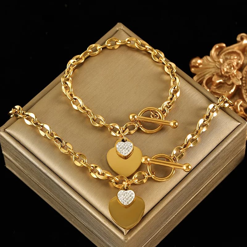 Juego de collar y pulsera de doble corazón, plata