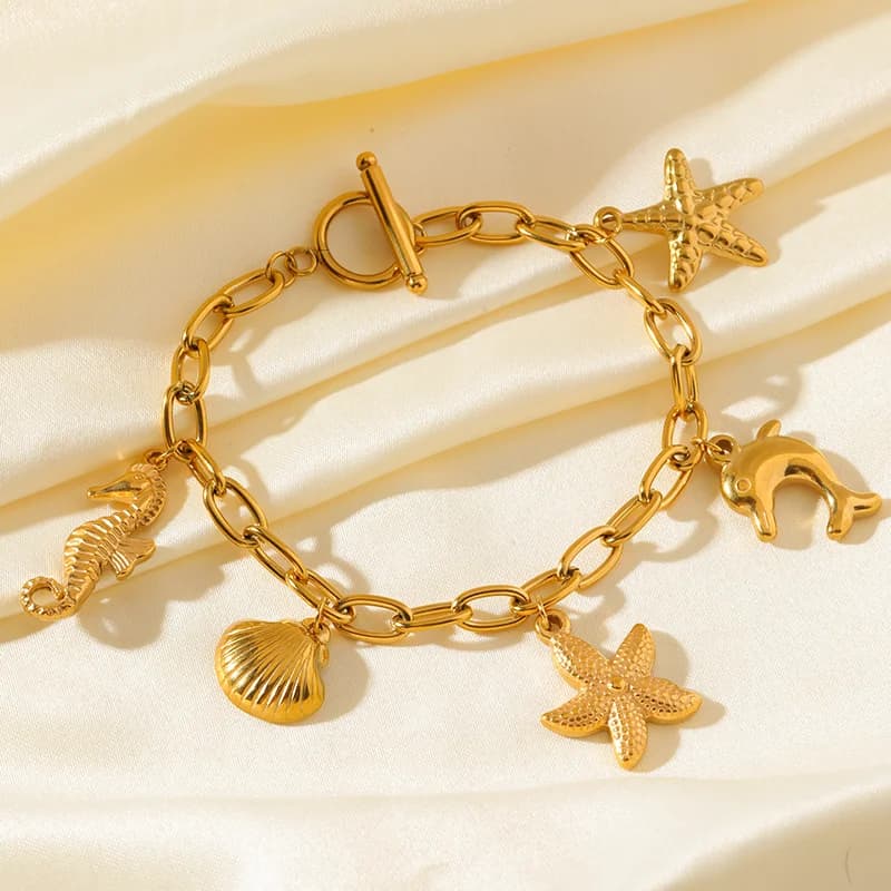 Pulsera de Acero Inoxidable con Abalorios de Estrella de Mar y Concha