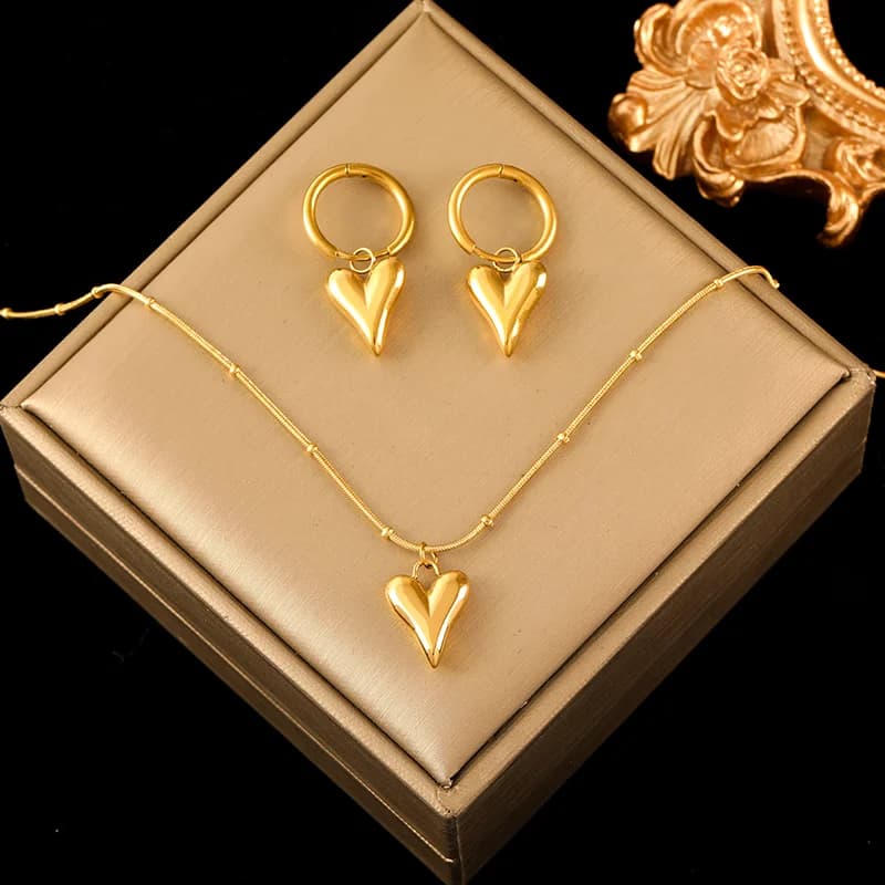 Set de collar y pendientes con dije de estrella de mar y perla de concha