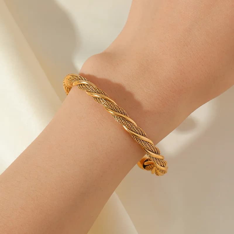 Brazalete ajustable trenzado en acero inoxidable 316L color oro