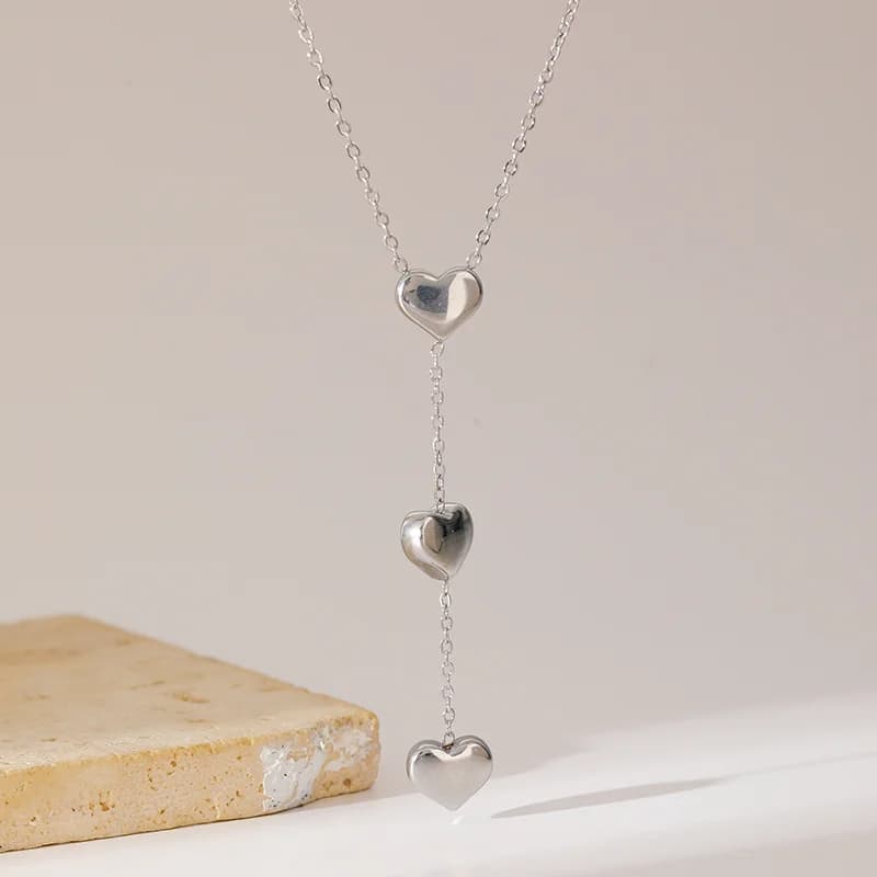Set de collar y pendientes con corazón brillante, plata