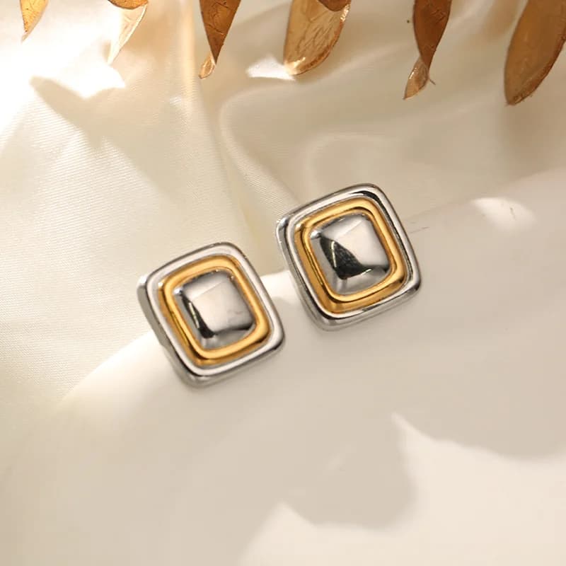 Pendientes de botón geométricos bicolor en acero inoxidable 316L