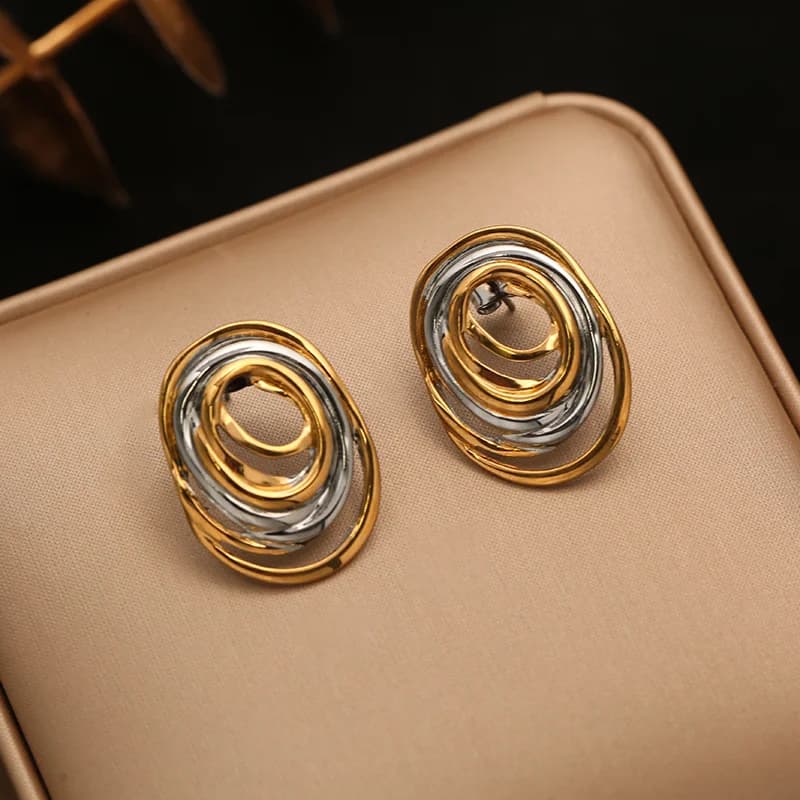 Pendientes de botón geométricos bicolor en acero inoxidable 316L