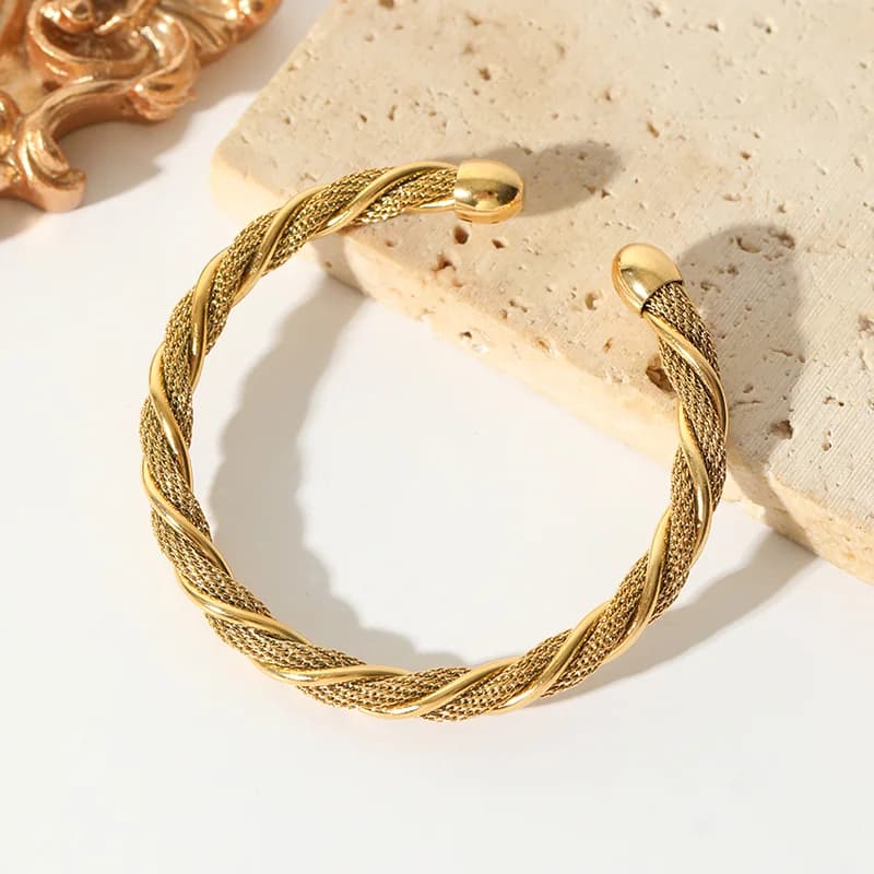 Brazalete ajustable trenzado en acero inoxidable 316L color oro